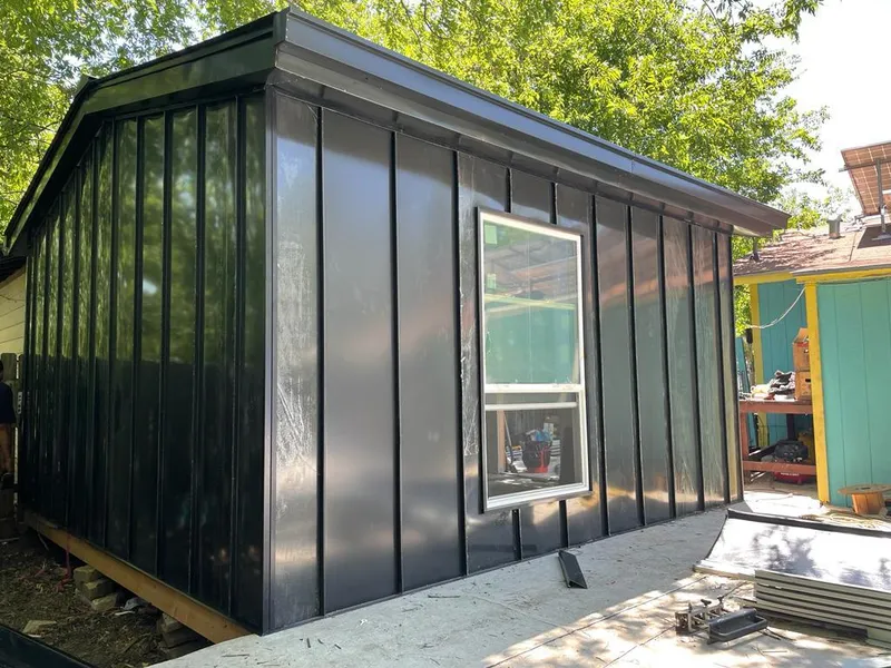 Black standing seam metal wall panels for Metal Roof Installation in Jarrell