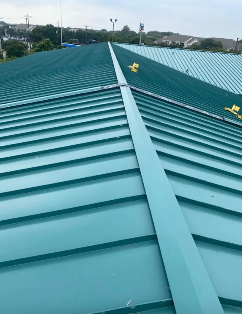 Green commercial metal roof ridge and valley for Metal Roof Repair in Jarrell