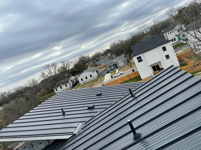 Standing seam metal roof panels with vents for Skylight Repair in Jarrell